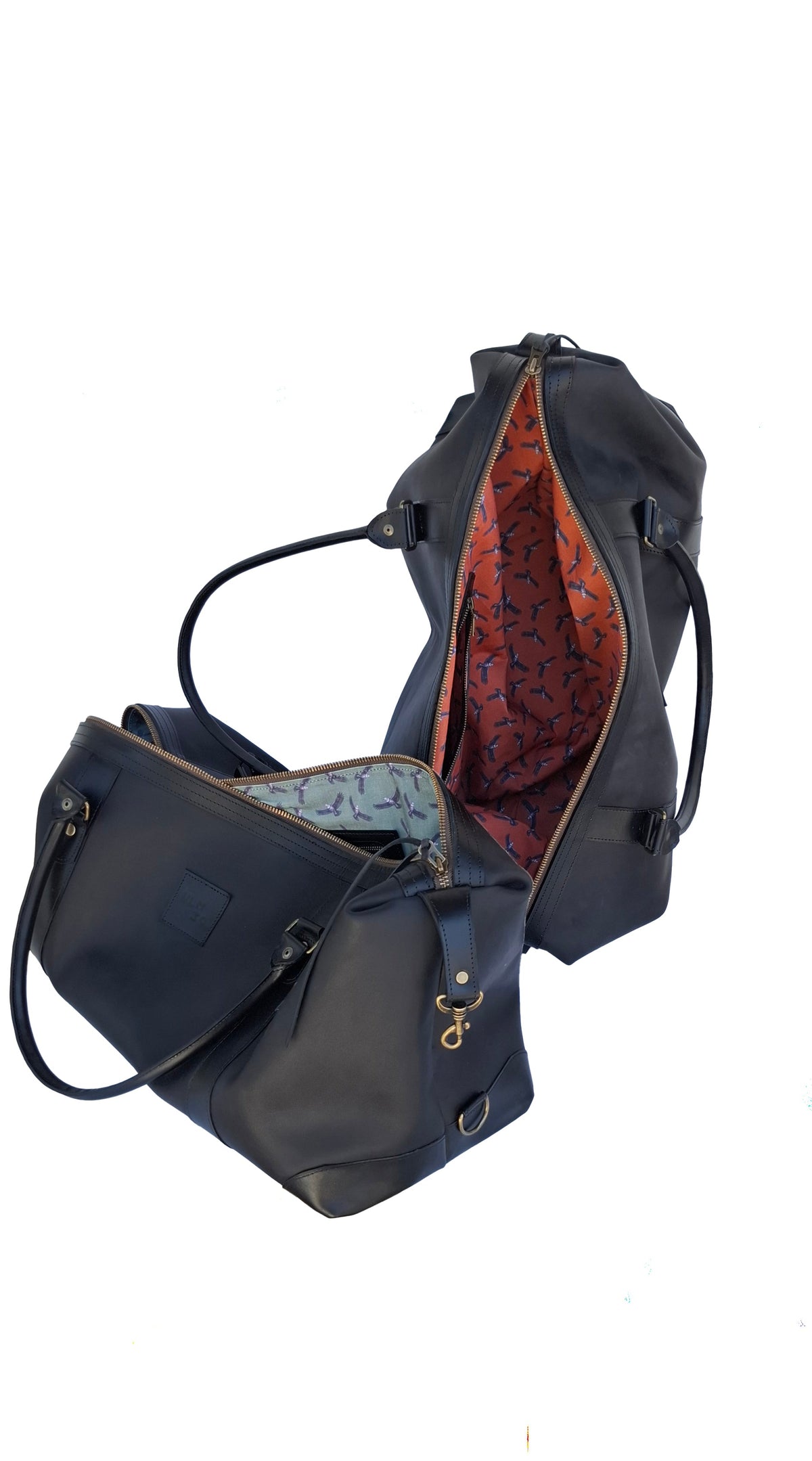 Bolso ULMMO Cuero Negro con forro cóndor naranjo