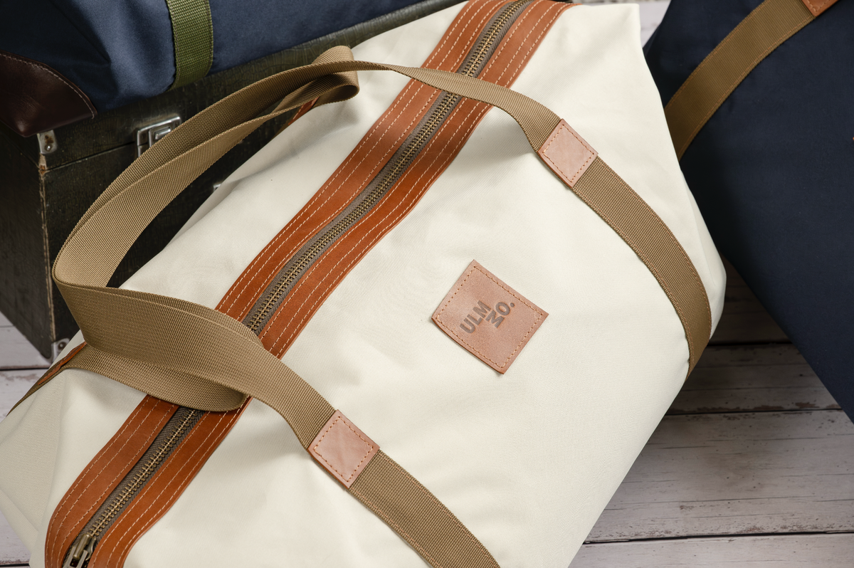 Bolso Impermeable · Crema con forro Cóndor Naranjo