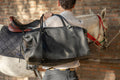 Bolso ULMMO Cuero Negro con forro cóndor azul