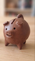 Chancho de greda alcancía café